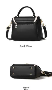 Dettagli del retro e del fondo della borsa in pelle nera con bordi color crema