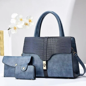 Three-piece dark blue crocodile embossed tote set with handbag and card holder