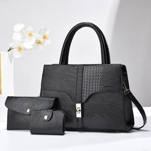 Three-piece black crocodile pattern handbag set with tote, clutch and card holder