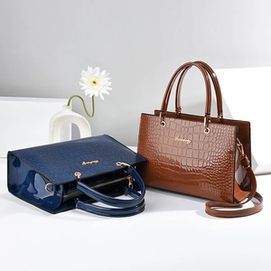 Polished stone pattern tote bag in navy and brown with dual handles and long shoulder strap