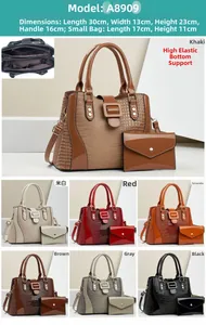 Dettaglio del set borsa tote e pochette con stampa lucida lucertola in sette colori