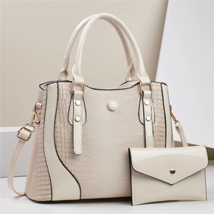 Lizard embossed two-piece handbag set with tote and envelope clutch in cream beige