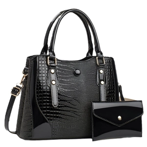 Chic black lizard texture composite handbag set with golden hardware and shoulder strap
