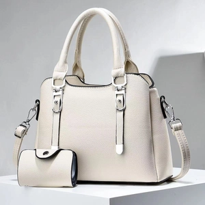 Detail of white lychee pattern leather tote bag set with matching small flap wallet