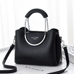 Fashionable black leather chain handbag with silver U-handle and crossbody strap