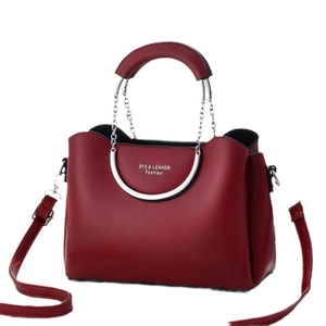 Deep red pebbled leather tote bag with silver chain metal handles and adjustable strap