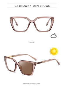 Cat-eye photochromic sunglasses showing lens color change from clear to brown