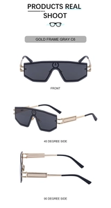 Multiple views of oversized shield sunglasses with gold frame and grey lenses
