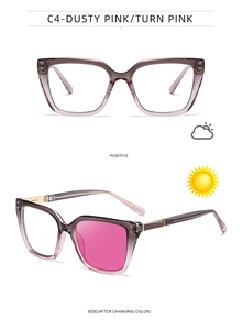 Detail of photochromic cat eye sunglasses showing light pink color change in sunlight