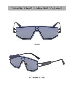 Close-up of gunmetal frame sunglasses with gray blue lenses and geometric shield shape