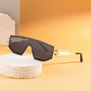 Fashionable oversized shield sunglasses with dark UV lenses and golden metal temples