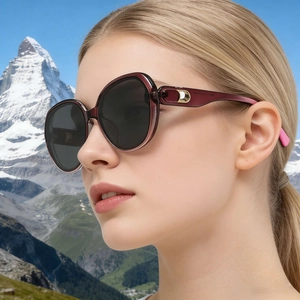 Chic burgundy oversized square sunglasses for women with golden metal D-shaped details