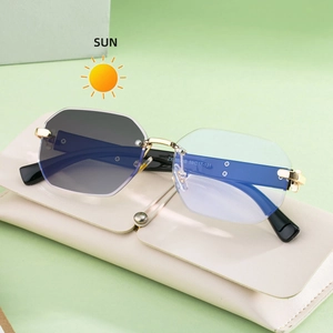 Square rimless gradient sunglasses with gold metal accents on a foldable leather case