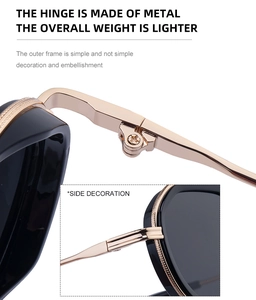 Detail of durable metal hinges and textured temple on black oval sunglasses