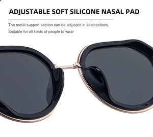 Detail of adjustable soft silicone nose pads and metal support on oval sunglasses