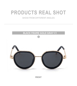 Front view of black oval sunglasses with gold metal temples and gray lenses C1