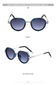 Close-up of blue striped oval sunglasses with silver metal bridge and gradient lenses