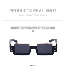 Front view of matte black square sunglasses with gold metal trim and gray lenses