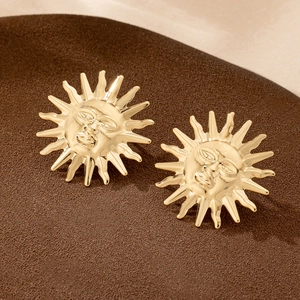 French vintage sun face stud earrings in gold finish with detailed embossed features