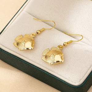 Elegant gold fish drop earrings with mesh scale texture displayed in a dark green box