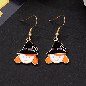 Macro detail of Halloween witch hat earrings with colorful enamel finish and gold accents