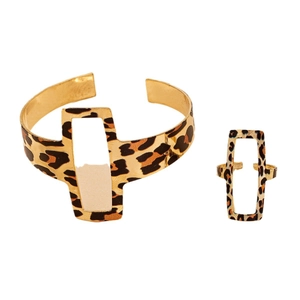 Golden cutout geometric jewelry set featuring leopard print open bangle and ring