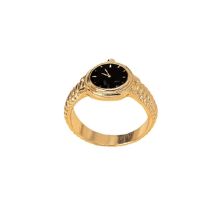 Elegant gold watch-style ring with black dial and textured band on white background