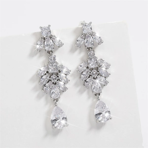 Detailed close-up of tassel earrings with marquise and pear-cut cubic zirconia crystals