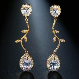Exquisite golden tassel earrings featuring vine design and sparkling zircon stones for gala