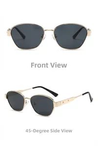 Close-up of gold metal sunglasses frame featuring small star relief on the temple arm