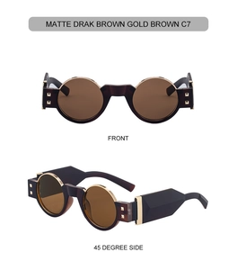 Vue détaillée des lunettes de soleil rondes vintage avec verres bruns mats et monture dorée