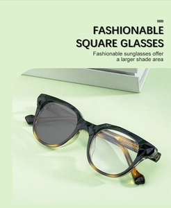 Détail de lunettes de soleil ovales avec monture géométrique en noir et écaille