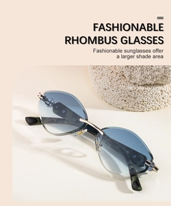 Détail des verres dégradés bleus losanges et du pont doré sur lunettes de soleil sans monture