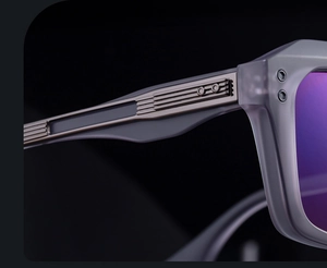 Macro shot of durable metal hinge on matte grey polarized square frame sunglasses