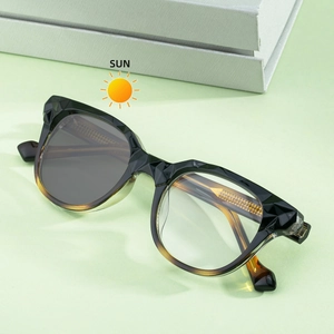 Lunettes de soleil photochromiques ovales tendance avec monture géométrique et UV
