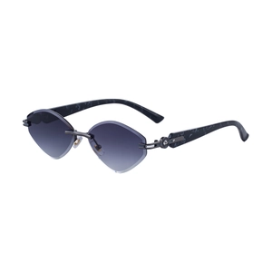 Lunettes de soleil œil de chat sans monture avec verres dégradés à facettes diamant