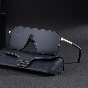 Lunettes de soleil oversize carrées avec branches dorées et étui en cuir noir élégant