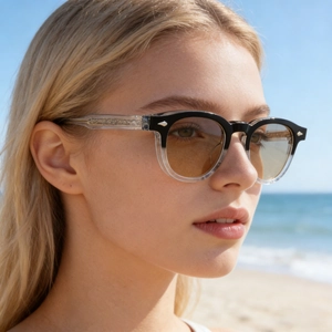 Detailed view of vintage square sunglasses with gold metal core and diamond rivets