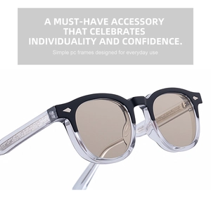 Detail of square photochromic sunglasses with vintage metal texture inside clear temples