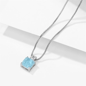 Minimalist silver necklace with square light blue gemstone pendant and box chain