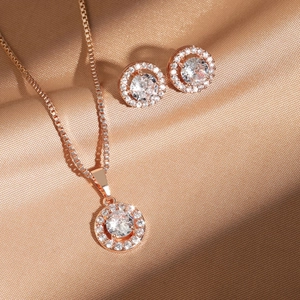 Parure bijoux en or rose avec collier et boucles d'oreilles ronds en oxyde de zirconium