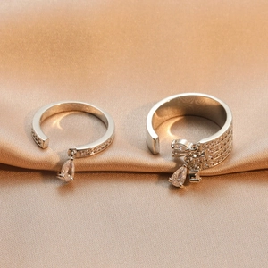 Elegant silver tassel rings set with pear-shaped cubic zirconia and pave rhinestones