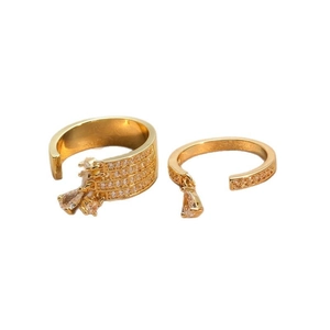 Elegant gold drop fringe ear cuff set with pear-cut zirconia and shimmering diamonds