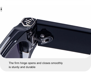 Detail of sturdy metal hinge on black oversized sunglasses with silver hexagon logo