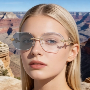 Lunettes De Soleil Sans Monture Mode Branches Serpent Métal Verres Photochromiques Protection UV Pour Femmes