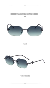 Detail of gunmetal rimless sunglasses with gradient lenses and snake design temple
