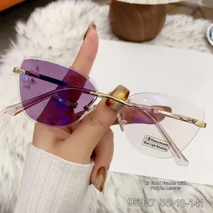 Detail of rimless photochromic sunglasses with gold bridge and purple arms, size 56-18-141