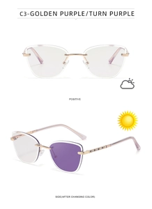 Detail of rimless cat-eye photochromic sunglasses with golden metal and purple rhinestones