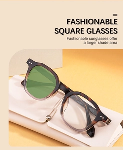 Détail de lunettes de soleil carrées en écaille avec verres verts et étui blanc