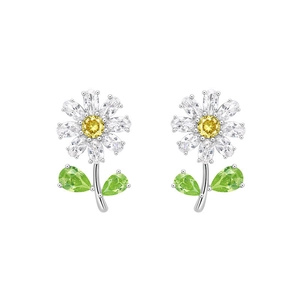Detailed close-up of zircon flower stud earrings with yellow, white and green stones